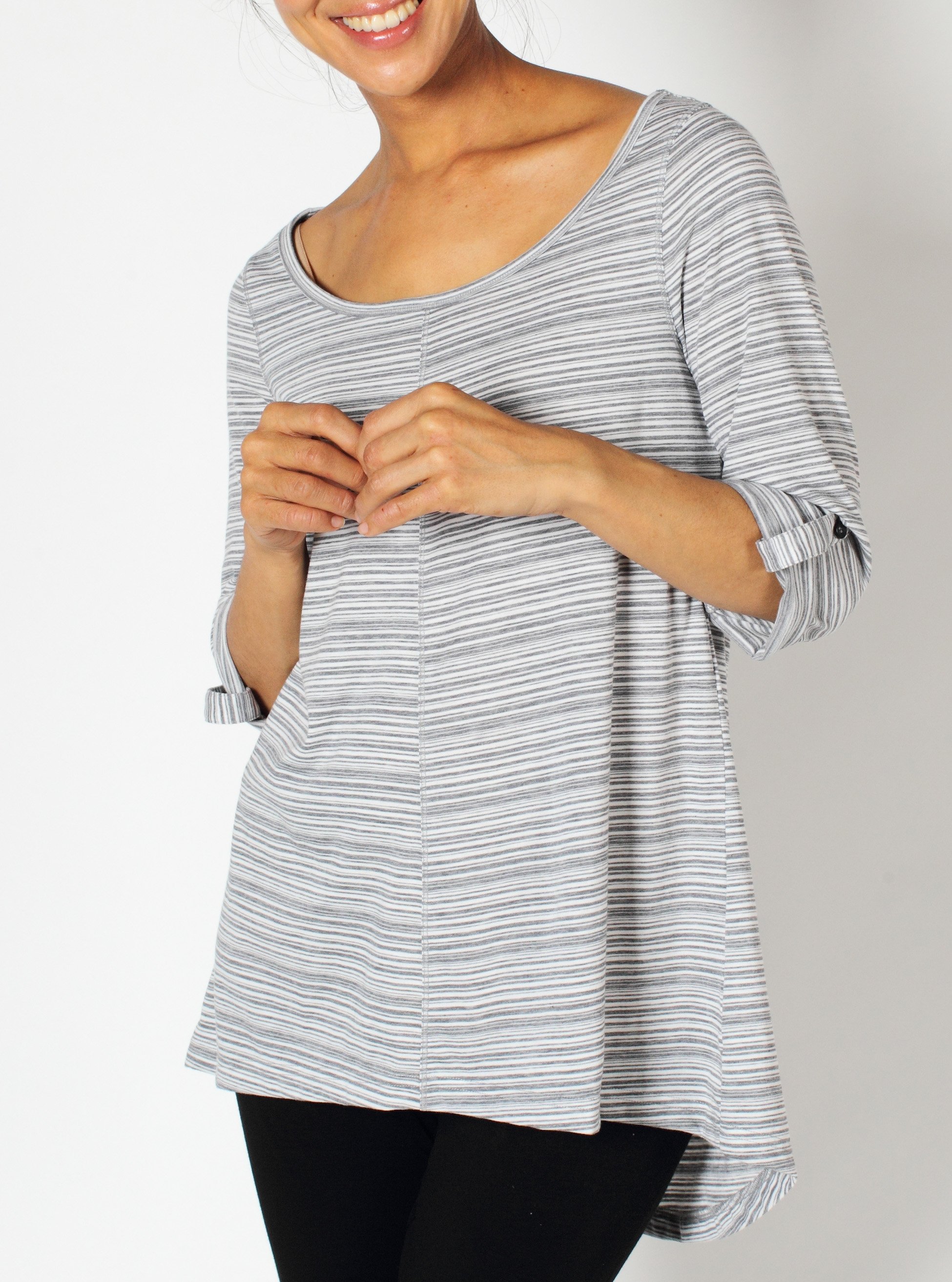 The Go-To Stripe Tunic, crafted from drirelease® performance fabric, is quick...