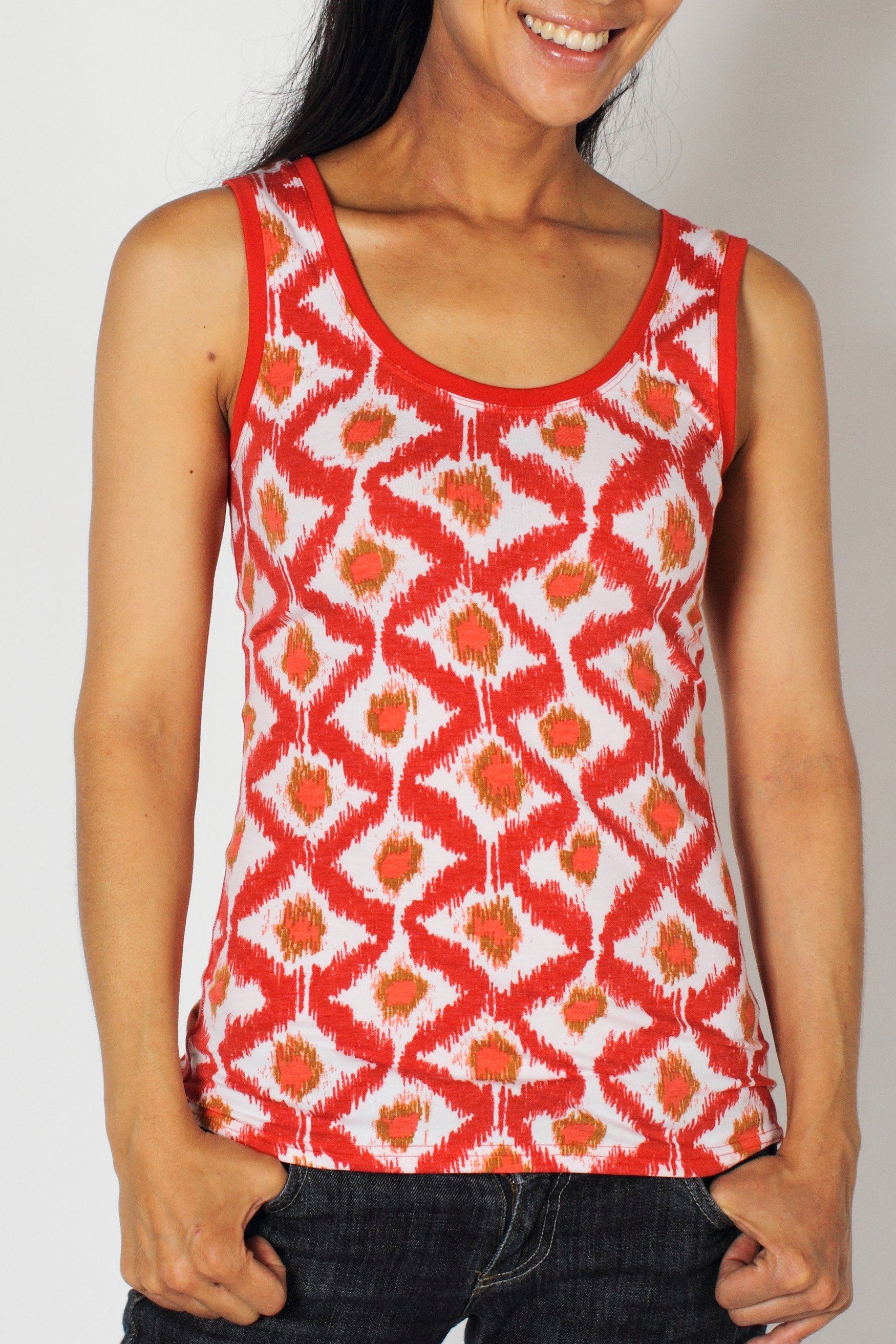 Spice up your outfit with the Go-To Diamond Tank. A fun print will add flair ...
