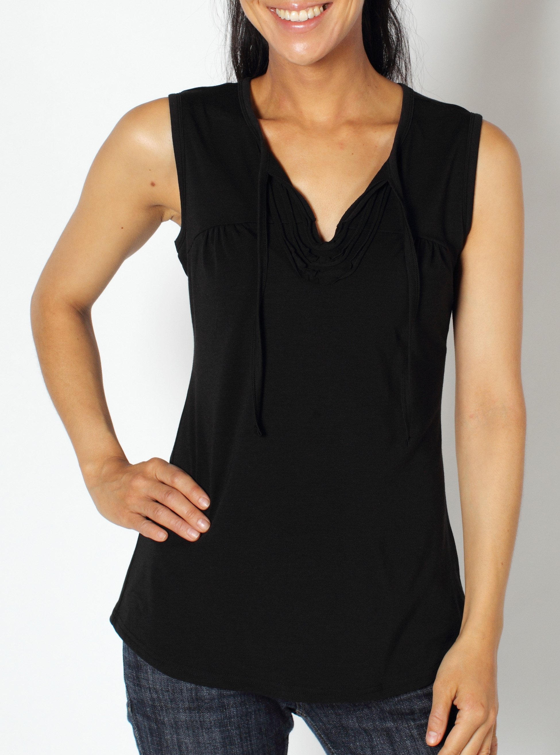 Look fashionable and feminine everywhere you roam in the Go-To Ruffle Tank. ...