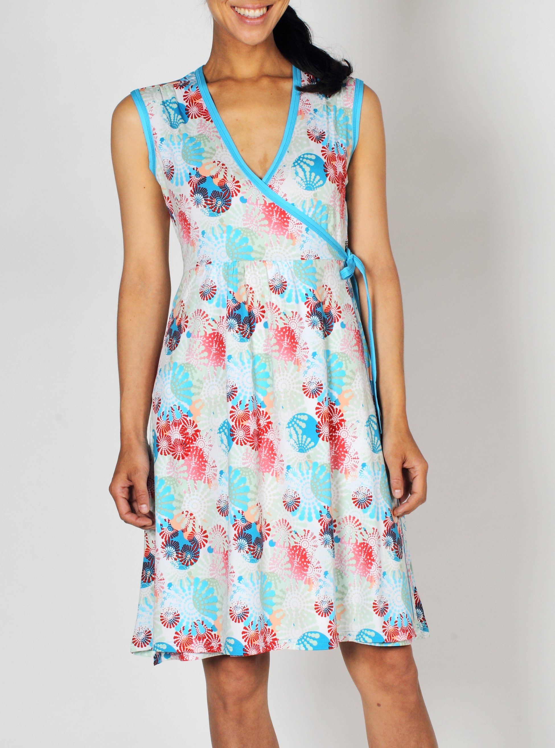 The Sol Cool™ Pinwheel Wrap Dress is versatility in a fun print. Wear it out ...