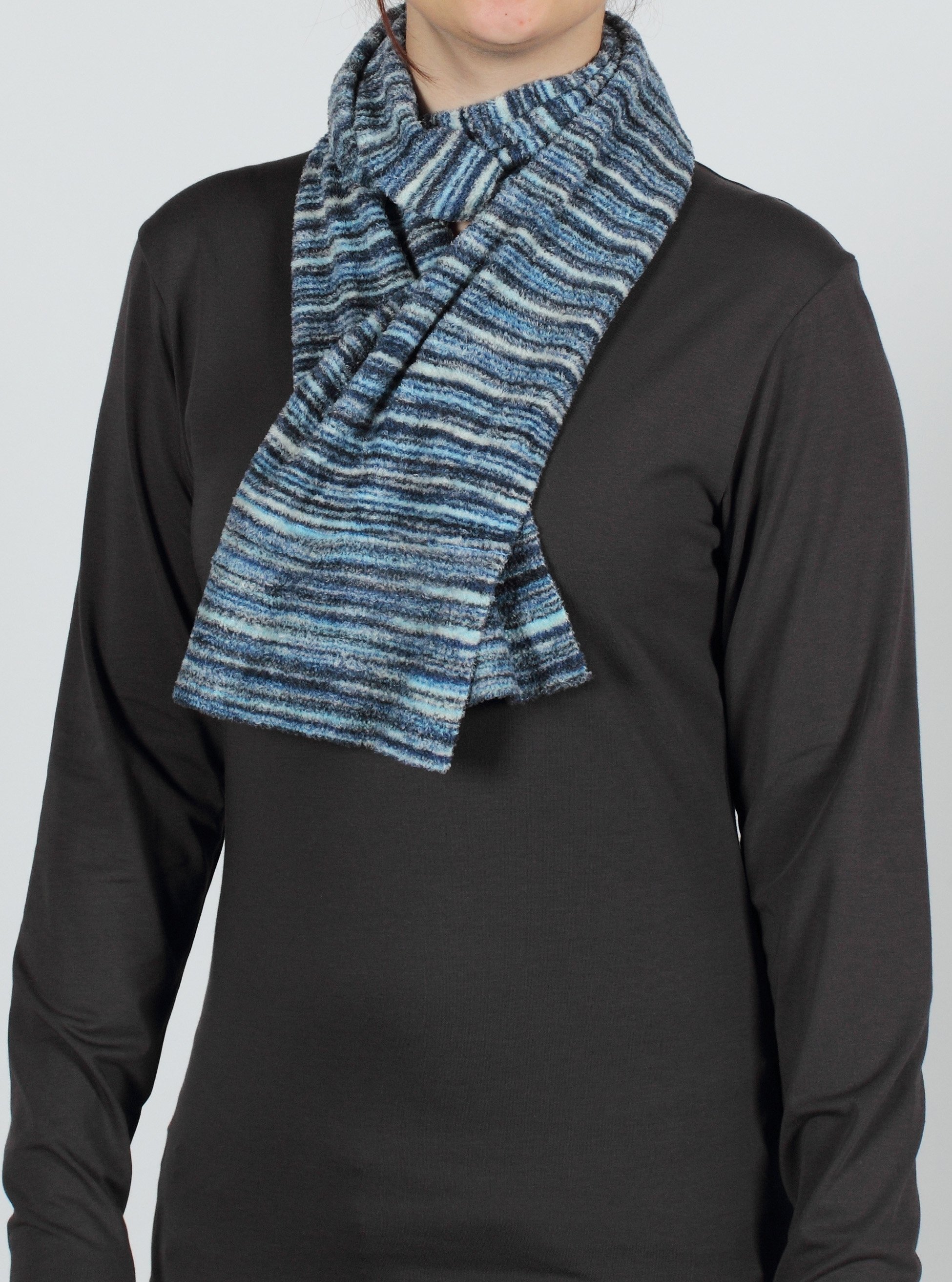 As soft and light as a cloud, the Irresistible Stripe scarf is a fun addition...