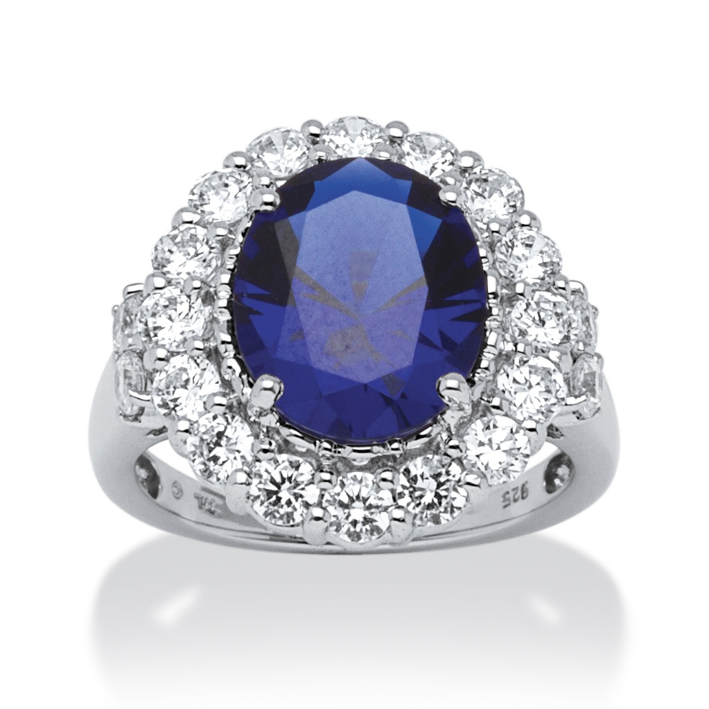 7.39 TCW Oval Midnight Blue Sapphire and Round Cubic Zirconia Ring in Platinum Over Sterling Silver